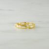 Gold-plated sterling silver ring with a bold linked surface