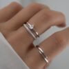 Sterling silver stacking ring with a slim rope design