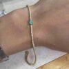 925 Silver tennis bracelet with emerald-coloured centre stone