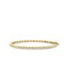 Gold-plated tennis bangle featuring a small marquise eye motif