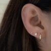 Hypoallergenic pear-shaped earrings sold as a pair