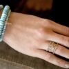 Triple-stone ring with bezel-set turquoise and premium CZ diamond accents