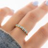 Simple ring design with a fresh turquoise accent