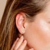 Gold-plated silver earrings with geometric stone setting