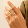 925 silver ring featuring a distinctive flowing wave pattern