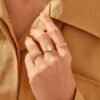 Stacking ring designed with a clean open wave silhouette