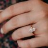 Elegant ring highlighting the elongated pear silhouette