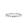 Elegant emerald and diamond ring with understated profile