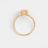 Pink diamond ring with pave setting and gold plating