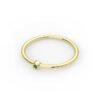 Minimal band with a row of emerald stones