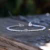 1.68ctw tennis bracelet with a polished sterling silver finish
