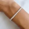 6.5-inch tennis bracelet with linked stone stations and box clasp