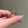 Elegant engagement ring with balanced pave stone detailing