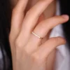 Diamond-style ring with pave-set stones and a slim band