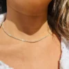 Long 30-inch tennis necklace designed for a full-line look