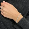 7.5-inch tennis bracelet with thick gold plating and prong settings