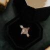 Elegant ring design with elongated lozenge cut and refined profile