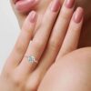 Round CZ diamond ring with pave-set stones along the band