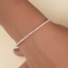 Gold-plated tennis bracelet with a neat 5.5-inch profile