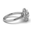Engagement ring with 20 side stones and a balanced halo silhouette