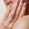Sterling silver engagement ring with prong-set round stones