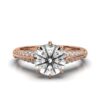 Diamond ring with 32 round side stones and 0.31ct total