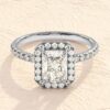 Sterling silver halo ring with an emerald-cut centre stone