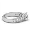 Round CZ diamond ring with balanced side stone detail