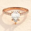 Elegant ring with a classic solitaire setting and pear cut