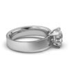 Minimal engagement ring with a refined solitaire stone setting