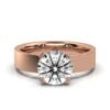 Polished sterling silver ring with a simple solitaire design