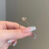 925 Sterling Silver ring featuring a 9.5 mm round stone