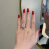 Polished sterling silver engagement ring with modern setting details