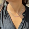 Tennis necklace featuring 5.50mm round CZ stones in a 4-prong setting