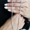 Classic tennis necklace with round stones and clean lines