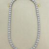 Gold-plated sterling silver tennis necklace with a continuous stone line