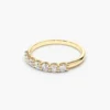 Elegant wedding band with seven round stones set in U-shape