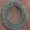 Sterling silver tennis necklace with four-prong stone settings