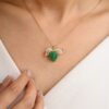 Leaf-inspired sterling silver brooch pendant with gemstone detail