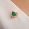 Sterling silver brooch pendant with a refined carved leaf shape