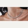 Gold-plated sterling silver necklace with a structured tennis design