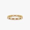 Sterling silver eternity band with alternating ruby and diamond stones