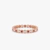 Alternating premium CZ ruby and diamond eternity band
