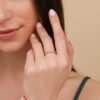 Gold-plated sterling silver ring with continuous gemstone setting