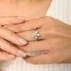 Aquamarine floral ring with a single diamond accent