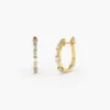 Gold-plated sterling silver earrings featuring baguette stone setting