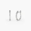 Baguette and round stone earrings with a refined, timeless design