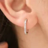 Classic earrings designed with baguette-set premium CZ diamond stones