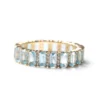 925 sterling silver eternity band with baguette blue topaz and diamond accents
