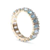 Baguette-cut blue topaz eternity ring with diamond details